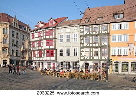 Lively pavement cafe at the Cathedral Square of Erford, Germany View Large Photo Image Stock Photography - Lively pavement cafe at the Cathedral Square of Erford, Germany . Fotosearch