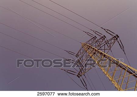 Stock Photo - Low angle view of electricity pylon . Fotosearch