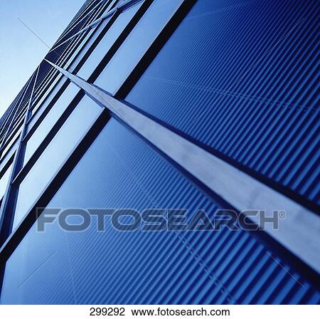 Stock Image - Low angle view of office building, La Defense, Paris, France . Fotosearch