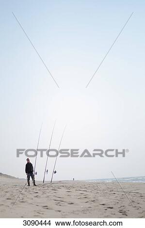 Picture - Man fishing, Rantum, Germany . Fotosearch