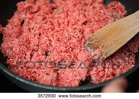 Minced meat roasted in a pan View Large Photo Image Stock Image - Minced meat roasted in a pan . Fotosearch