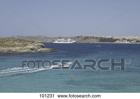 Stock Image - Motorboat in sea, Comino Island, Malta . Fotosearch