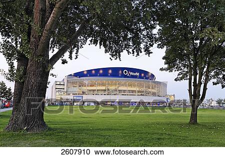 Stock Image - Office building lit up at dusk, O2 world, Kreuzberg, Berlin, Germany . Fotosearch