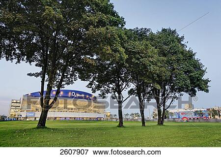 Stock Photo - Office building lit up at dusk, O2 world, Kreuzberg, Berlin, Germany . Fotosearch