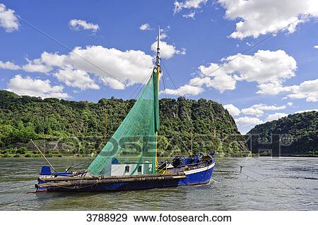 Old fishing boat in front of Loreley on Rhine, Sankt Goar, Germany View Large Photo Image Stock Photo - Old fishing boat in front of Loreley on Rhine, Sankt Goar, Germany . Fotosearch