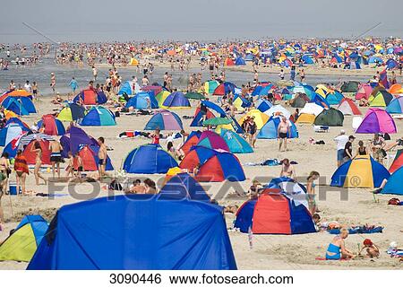 People at beach, Sankt Peter-Ording, Schleswig-Holstein, Germany View Large Photo Image Stock Photograph - People at beach, Sankt Peter-Ording, Schleswig-Holstein, Germany . Fotosearch