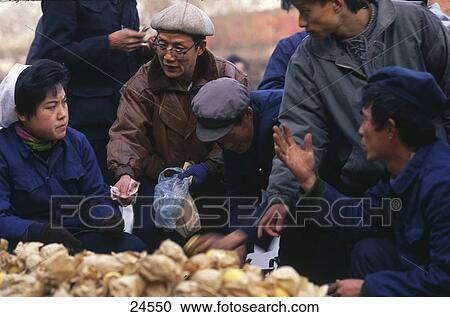 People bargaining at market stall, Beijing, China View Large Photo Image Stock Image - People bargaining at market stall, Beijing, China . Fotosearch