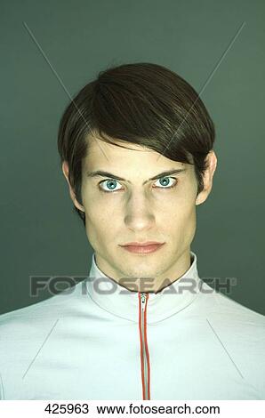 Portrait of young man looking angry View Large Photo Image Stock Image - Portrait of young man looking angry . Fotosearch