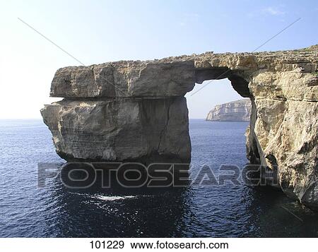 Rock formation in the sea, Azure, Gozo, Malta View Large Photo Image Stock Photo - Rock formation in the sea, Azure, Gozo, Malta . Fotosearch
