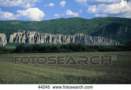 Rock formations at hillside, Les Mees, Alpes-de-Haute-Provence, France View Large Photo Image Stock Photography - Rock formations at hillside, Les Mees, Alpes-de-Haute-Provence, France . Fotosearch