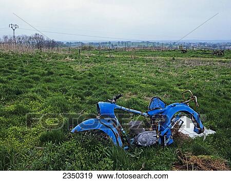 Ruins of motorbike in field, Mecklenburg-Western Pomerania, Germany View Large Photo Image Stock Photo - Ruins of motorbike in field, Mecklenburg-Western Pomerania, Germany . Fotosearch