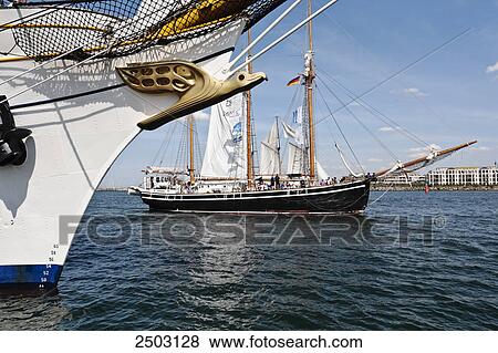 Stock Photo - Sailboats in sea, Baltic sea, Warnemunde, Rostock, Mecklenburg-Western Pomerania, Germany . Fotosearch