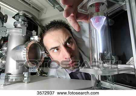 Scientist experimenting with plasma, Uni Kiel, Schleswig-Holstein, Germany, Europe View Large Photo Image Stock Photo - Scientist experimenting with plasma, Uni Kiel, Schleswig-Holstein, Germany, Europe . Fotosearch