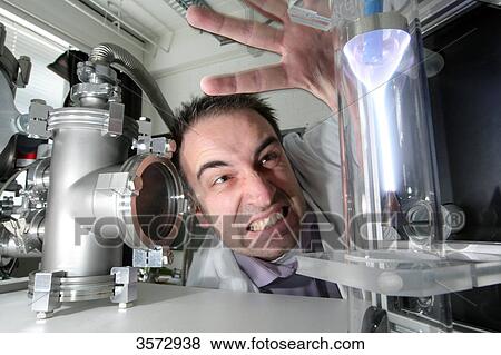Scientist experimenting with plasma, Uni Kiel, Schleswig-Holstein, Germany, Europe View Large Photo Image Stock Photo - Scientist experimenting with plasma, Uni Kiel, Schleswig-Holstein, Germany, Europe . Fotosearch