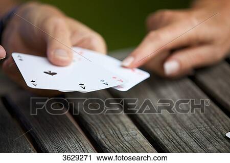 Senior couple playing cards, close-up View Large Photo Image Stock Image - Senior couple playing cards, close-up . Fotosearch