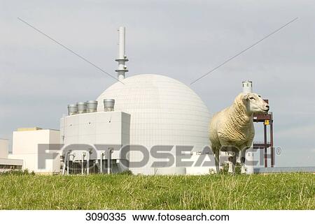 Sheep on meadow, nuclear plant Brokdorf in the back View Large Photo Image Stock Photography - Sheep on meadow, nuclear plant Brokdorf in the back . Fotosearch