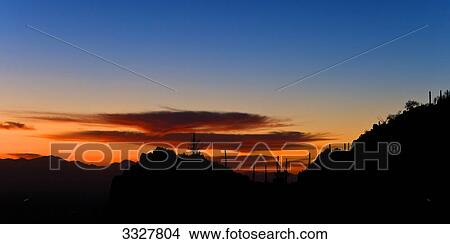 Silhouette of landscape in Saguaro National Park at sunset, Arizona, USA View Large Photo Image Picture - Silhouette of landscape in Saguaro National Park at sunset, Arizona, USA . Fotosearch