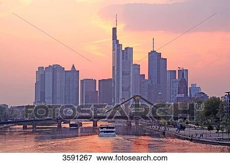 Skyline of Frankfurt am Main at sunset, Germany View Large Photo Image Stock Photo - Skyline of Frankfurt am Main at sunset, Germany . Fotosearch