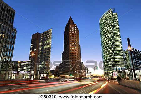 Skyscrapers lit up at dusk, BahnTower, Kollhoff Tower, Potsdamer Platz, Berlin, Germany View Large Photo Image Stock Image - Skyscrapers lit up at dusk, BahnTower, Kollhoff Tower, Potsdamer Platz, Berlin, Germany . Fotosearch