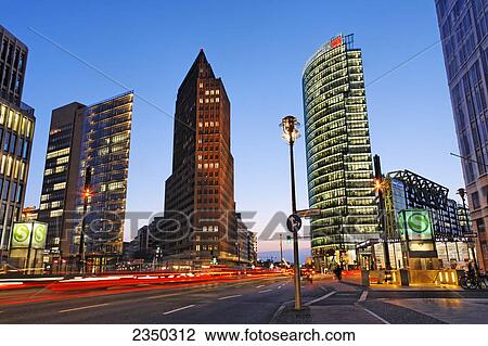 Skyscrapers lit up at dusk, BahnTower, Kollhoff Tower, Potsdamer Platz, Berlin, Germany View Large Photo Image Stock Image - Skyscrapers lit up at dusk, BahnTower, Kollhoff Tower, Potsdamer Platz, Berlin, Germany . Fotosearch