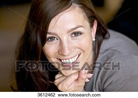 Smiling brunette woman, portrait View Large Photo Image Stock Image - Smiling brunette woman, portrait . Fotosearch