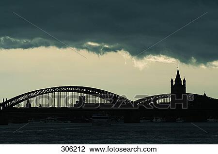 Stormclouds over bridge, Hohenzollern Bridge, Cologne, North Rhine Westphalia, Germany, Europe View Large Photo Image Stock Image - Stormclouds over bridge, Hohenzollern Bridge, Cologne, North Rhine Westphalia, Germany, Europe . Fotosearch