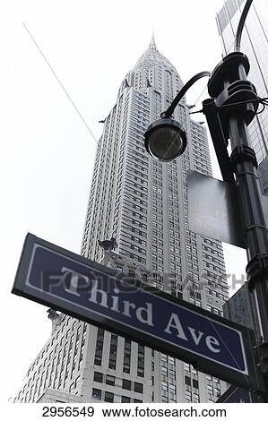 Street sign of the Third Avenue in front of the Chrysler Building, New York City, USA, worm's-eye view View Large Photo Image Stock Photo - Street sign of the Third Avenue in front of the Chrysler Building, New York City, USA, worm's-eye view . Fotosearch