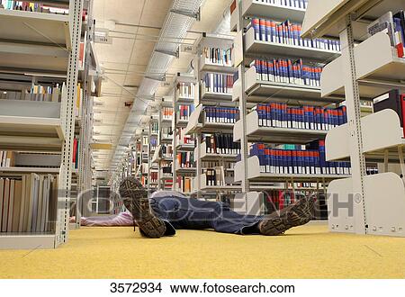 Student in library, Uni Kiel, Schleswig-Holstein, Germany, Europe View Large Photo Image Picture - Student in library, Uni Kiel, Schleswig-Holstein, Germany, Europe . Fotosearch