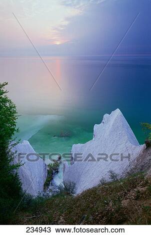 Sunrise over sea, Jasmund National Park, Ruegen, Mecklenburg-Western Pomerania, Germany View Large Photo Image Stock Image - Sunrise over sea, Jasmund National Park, Ruegen, Mecklenburg-Western Pomerania, Germany . Fotosearch