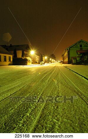 Tire tracks on snowy road, Germany View Large Photo Image Stock Photo - Tire tracks on snowy road, Germany . Fotosearch