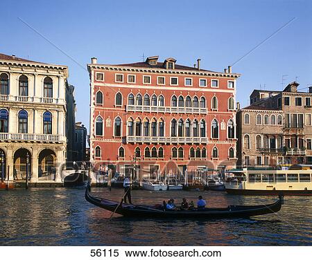 Stock Photography - Tourists traveling in gondola, Grand Canal, Venice, Italy . Fotosearch