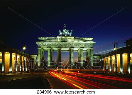 Traffic on road at night, Quadriga Statue, Brandenburg Gate, Berlin, Germany View Large Photo Image Stock Photograph - Traffic on road at night, Quadriga Statue, Brandenburg Gate, Berlin, Germany . Fotosearch