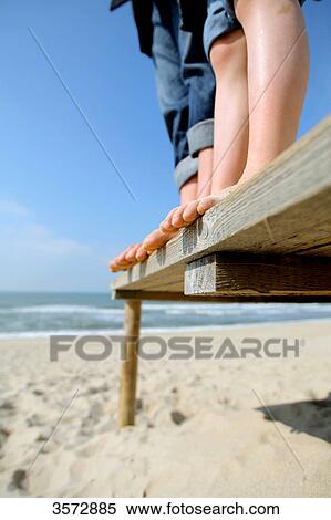 Two tourists standing on boardwalk, Hoernum, Sylt, Schleswig-Holstein, Germany, Europe View Large Photo Image Stock Photography - Two tourists standing on boardwalk, Hoernum, Sylt, Schleswig-Holstein, Germany, Europe . Fotosearch
