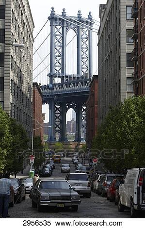 Urban canyon in Brooklyn with view to the Manhattan Bridge, New York City, USA View Large Photo Image Stock Photography - Urban canyon in Brooklyn with view to the Manhattan Bridge, New York City, USA . Fotosearch