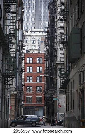 Urban canyon in the TriBeCa quarter, Manhattan, New York City, USA View Large Photo Image Stock Photo - Urban canyon in the TriBeCa quarter, Manhattan, New York City, USA . Fotosearch