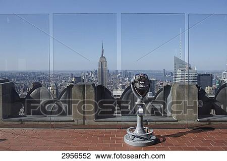 Viewing platform of the Rockefeller Center with Empire State Building in the background, New York City, USA View Large Photo Image Stock Image - Viewing platform of the Rockefeller Center with Empire State Building in the background, New York City, USA . Fotosearch