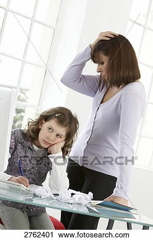 Woman and her daughter looking stressed View Large Photo Image Stock Image - Woman and her daughter looking stressed . Fotosearch