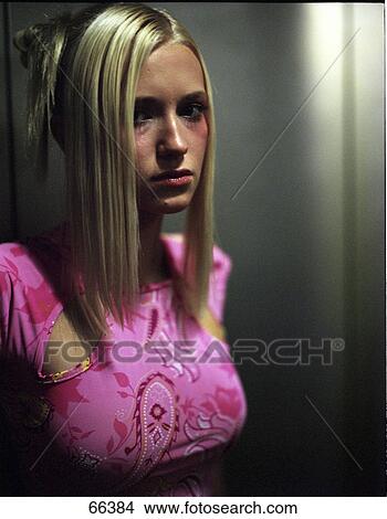 Young woman in elevator View Large Photo Image Picture - Young woman in elevator . Fotosearch