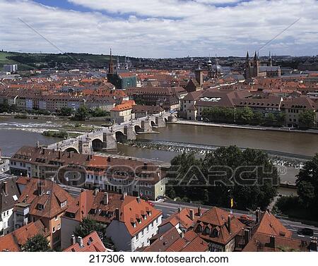 Stock Photograph - Aerial view of arch bridge across river, Bavaria, Germany . Fotosearch