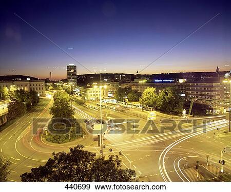 Stock Photo - Aerial view of city road lit up at night, Dusseldorf, Germany . Fotosearch
