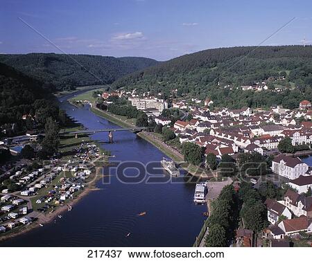 Aerial view of river flowing through town View Large Photo Image Stock Photo - Aerial view of river flowing through town . Fotosearch