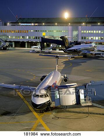 Airplane at airport, Dusseldorf, North Rhine-Westphalia, Germany View Large Photo Image Picture - Airplane at airport, Dusseldorf, North Rhine-Westphalia, Germany . Fotosearch