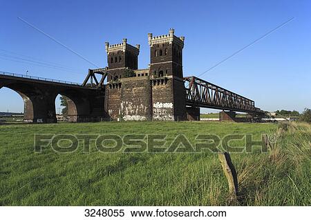 Ancient railway bridge in Duisburg, Germany, low angle view View Large Photo Image Stock Photography - Ancient railway bridge in Duisburg, Germany, low angle view . Fotosearch