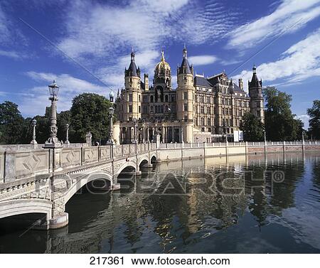Arch bridge across river in city View Large Photo Image Stock Image - Arch bridge across river in city . Fotosearch
