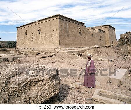Stock Photo - Bedouin in front of Hathor temple, Dendera, Egypt . Fotosearch
