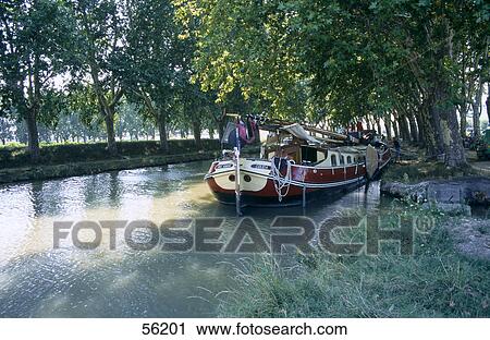 Stock Image - Boat in river . Fotosearch