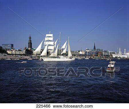 Stock Photograph - Boats at harbor, Elbe River, Germany . Fotosearch