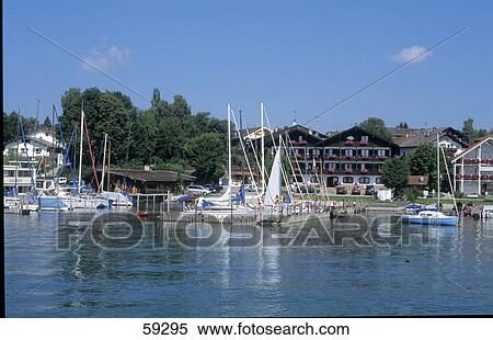 Stock Photography - Boats in harbor, Lake Chiemsee, Bavaria, Germany . Fotosearch