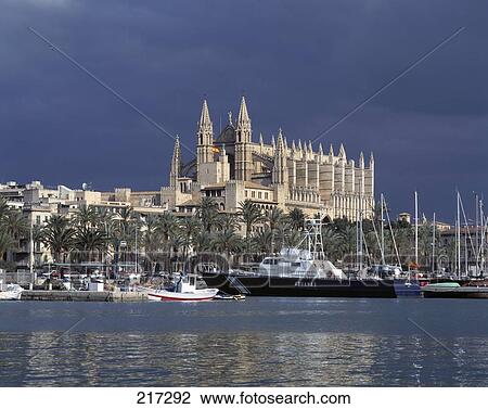 Boats in river with cathedral in background, Balearic Islands, Spain View Large Photo Image Stock Image - Boats in river with cathedral in background, Balearic Islands, Spain . Fotosearch