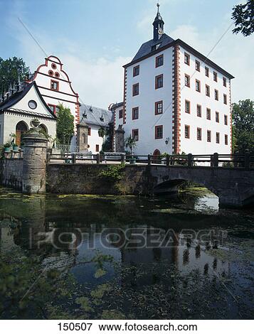 Stock Photo - Bridge across river leading to castle, Thuringia, Germany . Fotosearch